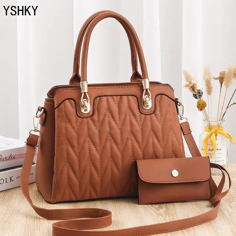 Women's leather luxury designer handbag