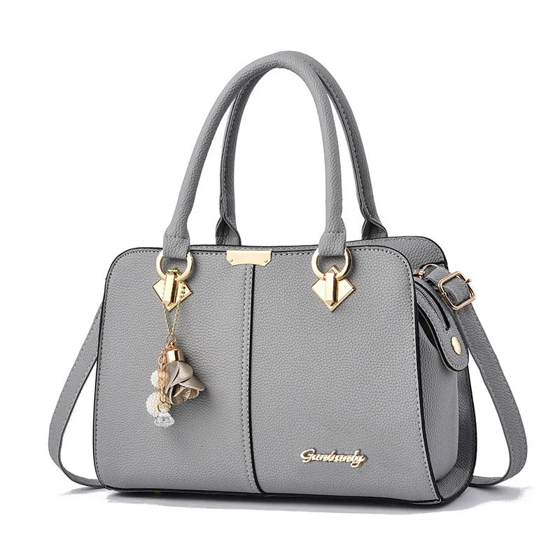 Women's leather luxury designer handbag